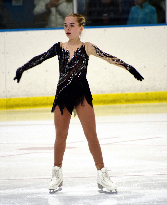 black and gold figure skating dresses